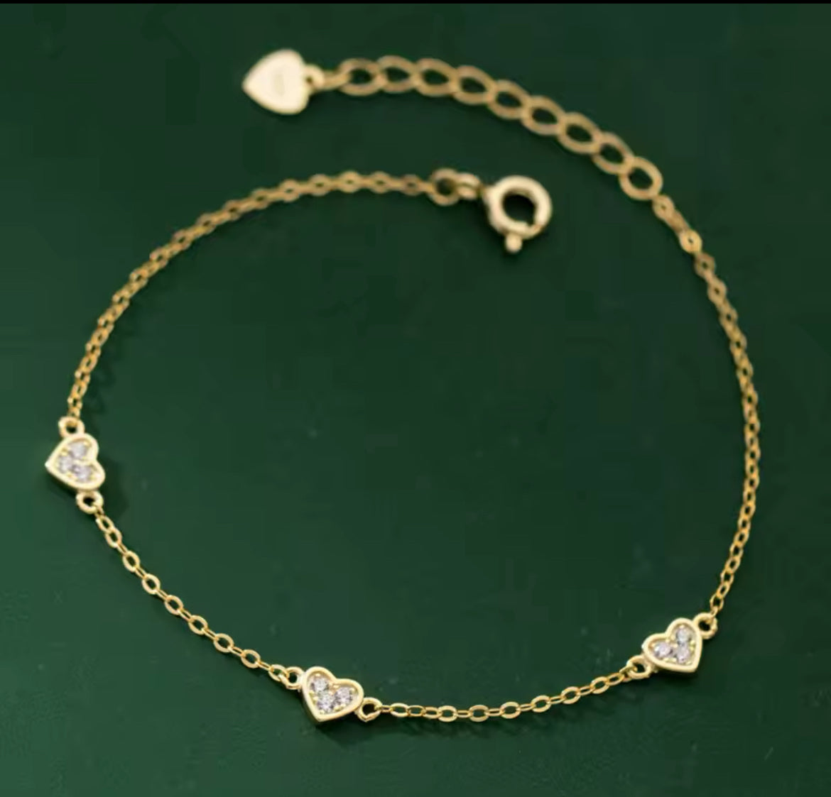 Pulsera de Plata 925 con Baño de Oro 14k y Zirconias, modelo Corazones