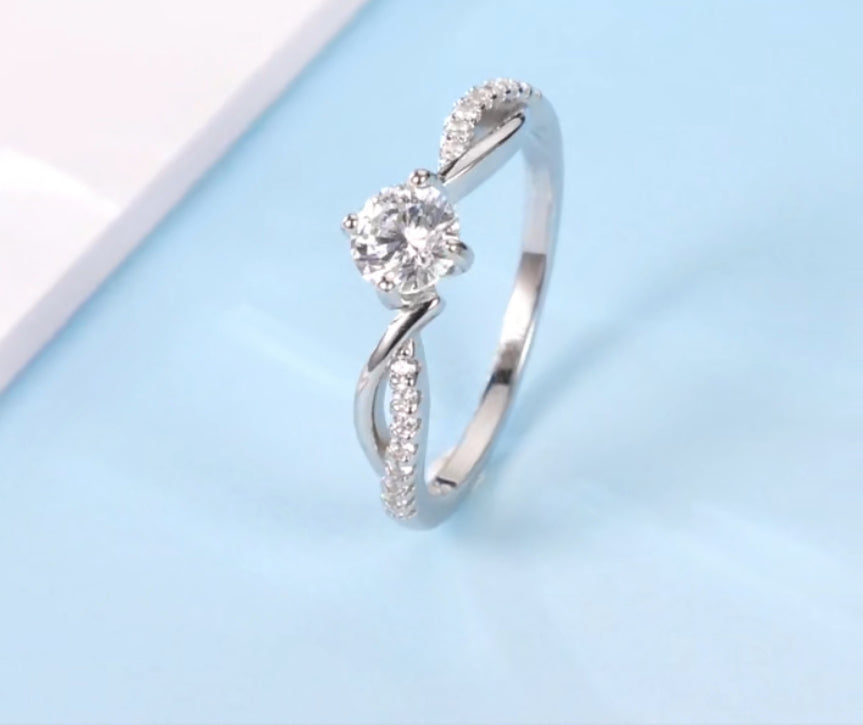 Anillo de Plata 925 con Zirconias, modelo Infinito