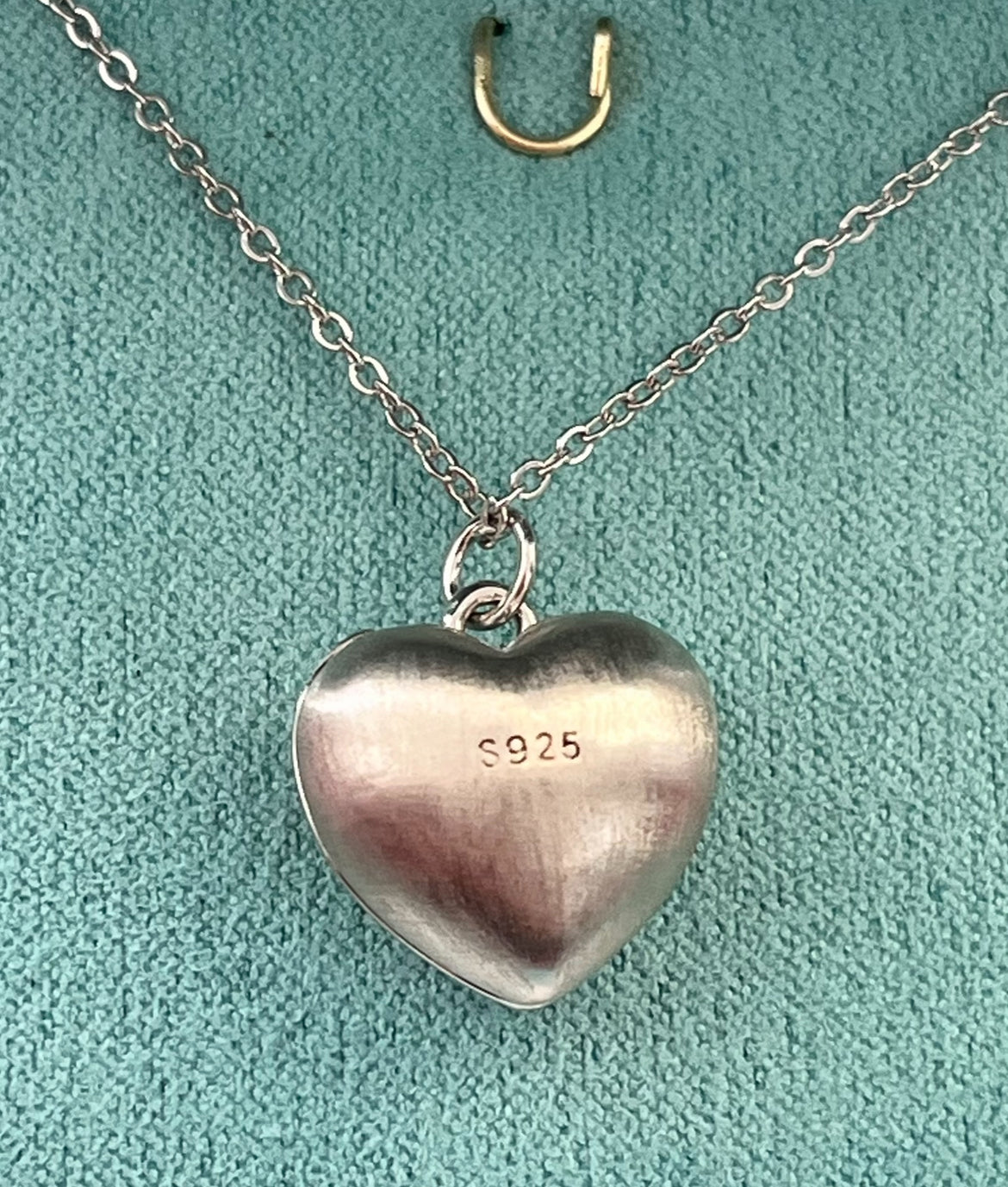 Relicario de Plata 925 con Zirconias, grabado “Tienes mi Corazón “
