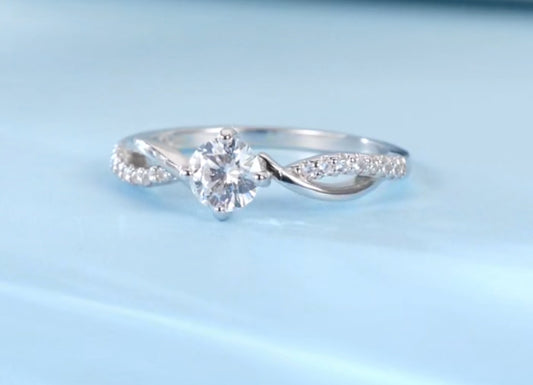 Anillo de Plata 925 con Zirconias, modelo Infinito
