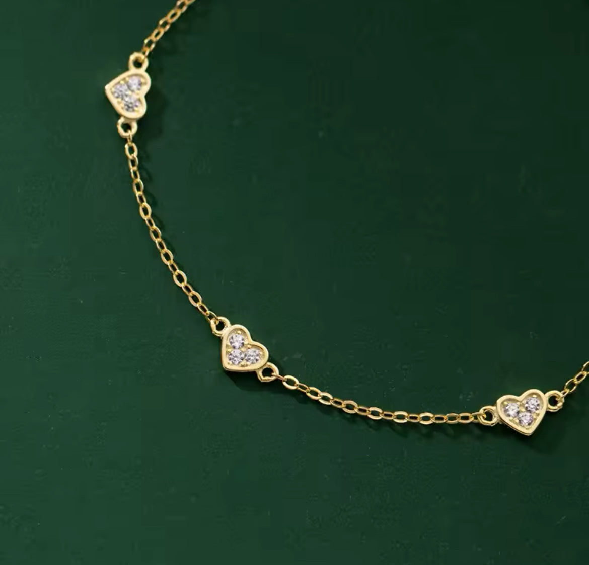 Pulsera de Plata 925 con Baño de Oro 14k y Zirconias, modelo Corazones